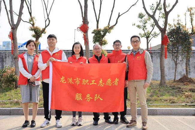学党史，强信念 龙港市水务公司党总支开展植树活动