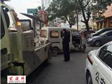 龙港治堵在行动：交警清理“僵尸车” 为城市道路“排毒”治堵