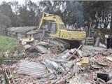 拆除违章建筑 继续推进拆违建绿工程