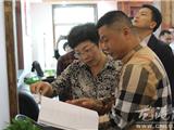 李青：党建党务两手抓 承担责任抓落实