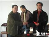 新雅集团再次向江山乡都口村委送上慰问金1万元