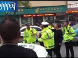温州一妇女大马路上怒扇交警耳光 被依法刑拘